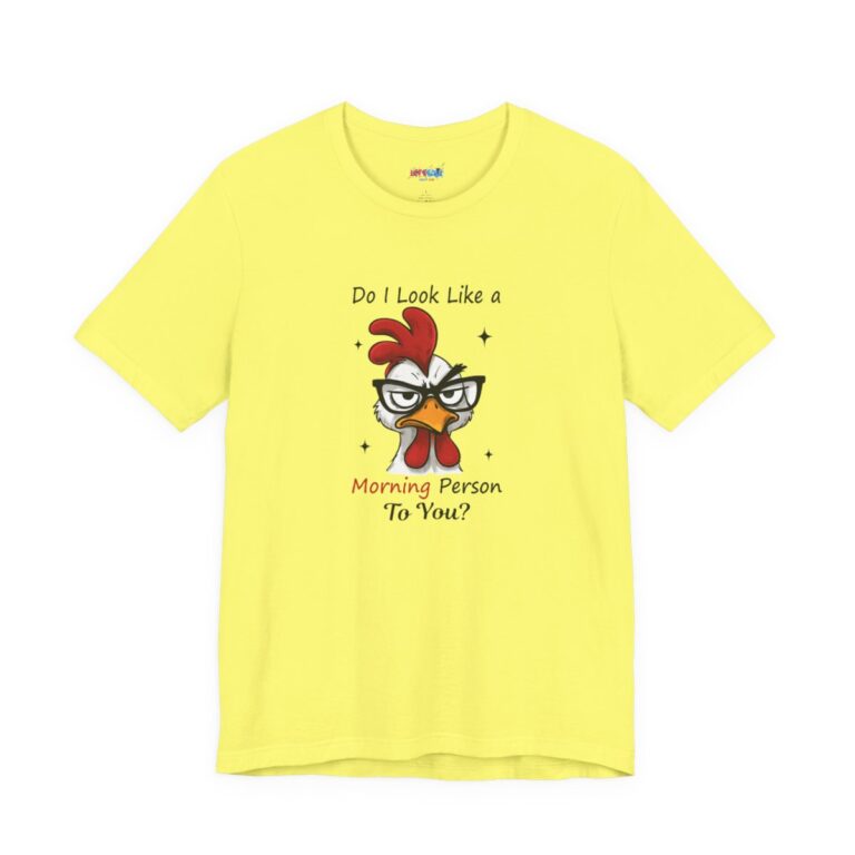 Cinematic studio macro shot of a Bella+Canvas 3001 t-shirt featuring a highly detailed, cheeky rooster illustration with the text "Do I Look Like a Morning Person To You?", highlighting the vibrant ink on the soft cotton.